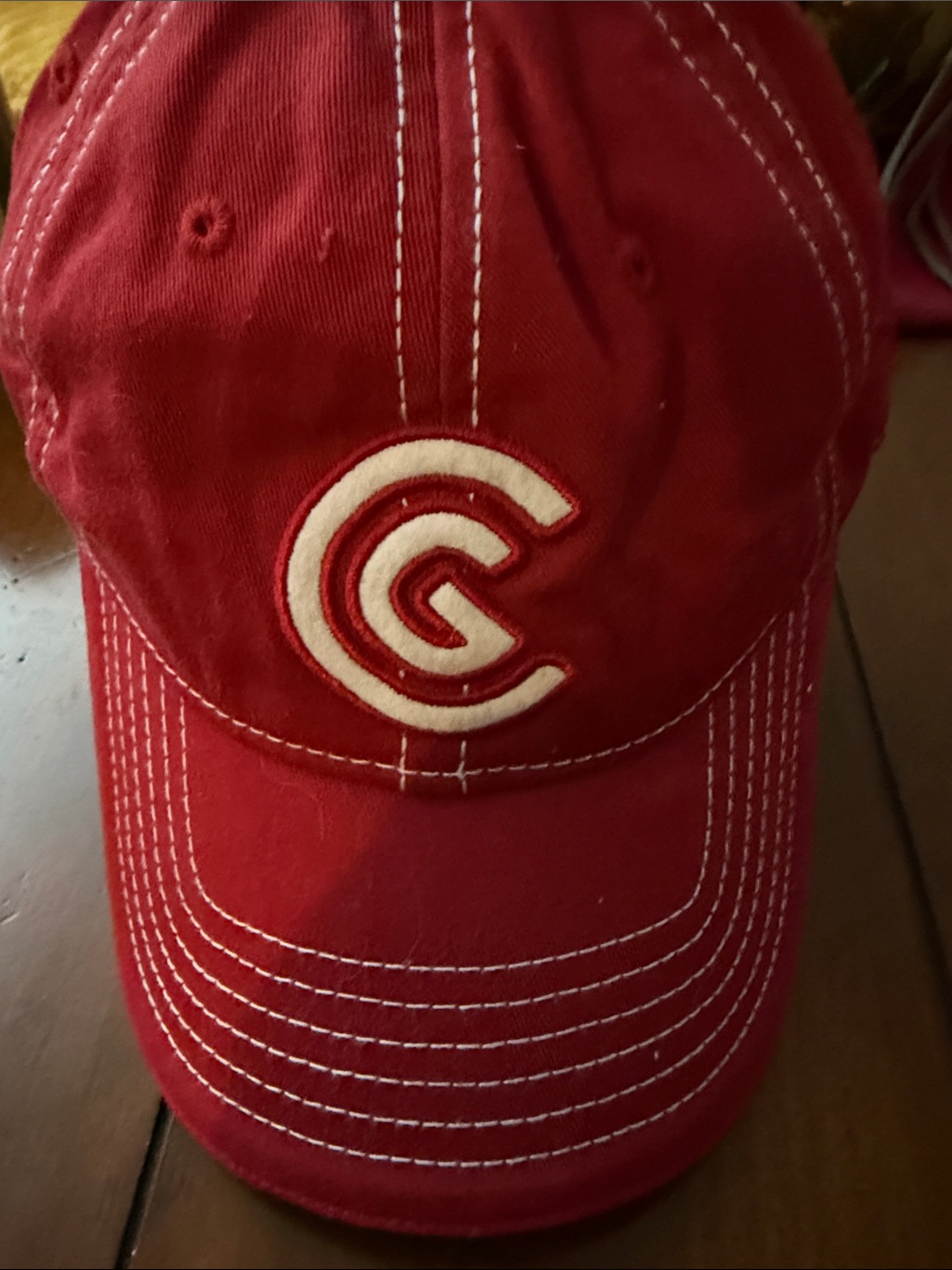 Red Baseball Cap With White Embroidered C Logo